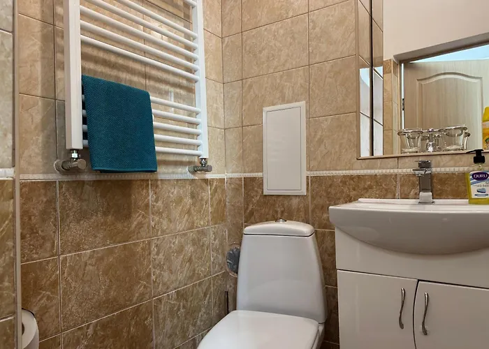 двоповерхові мілена у центрі з балконом, та паркінгом Apartment *